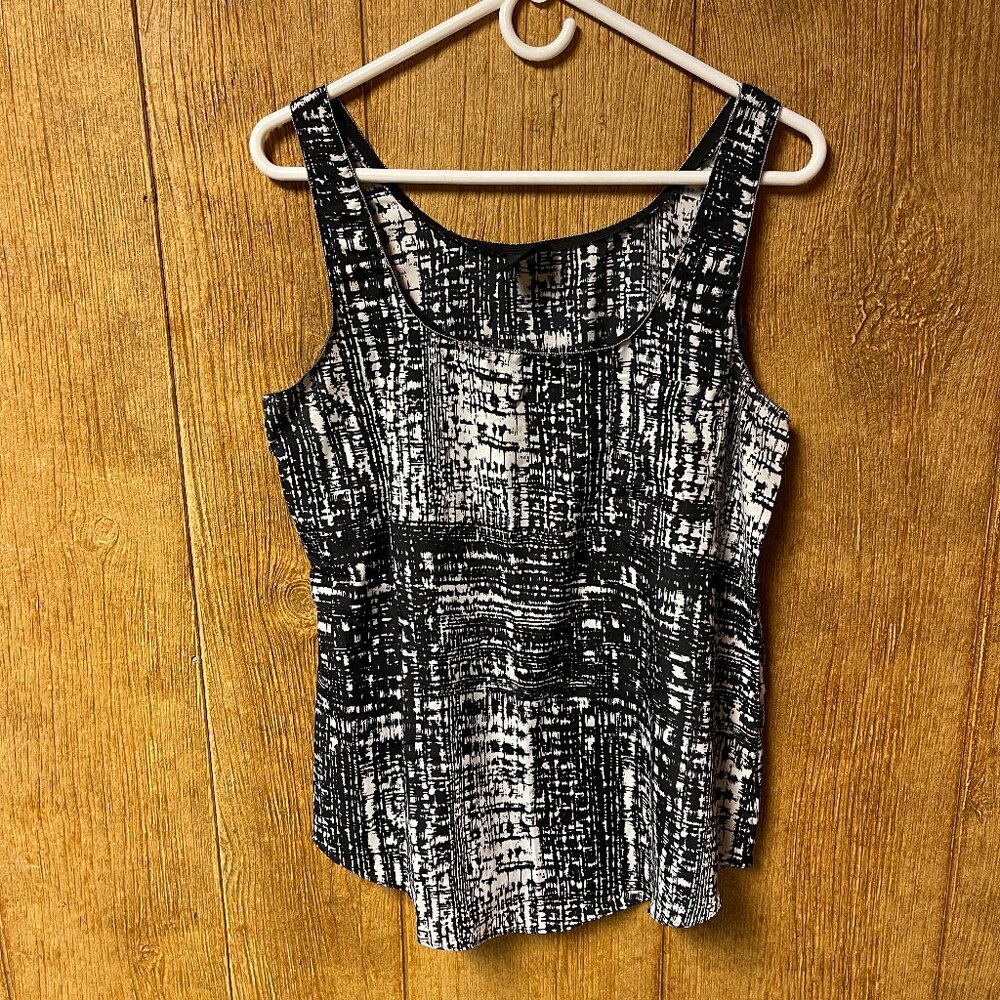 Black and white rayon sleeveless with metal neck and arm hole detailing